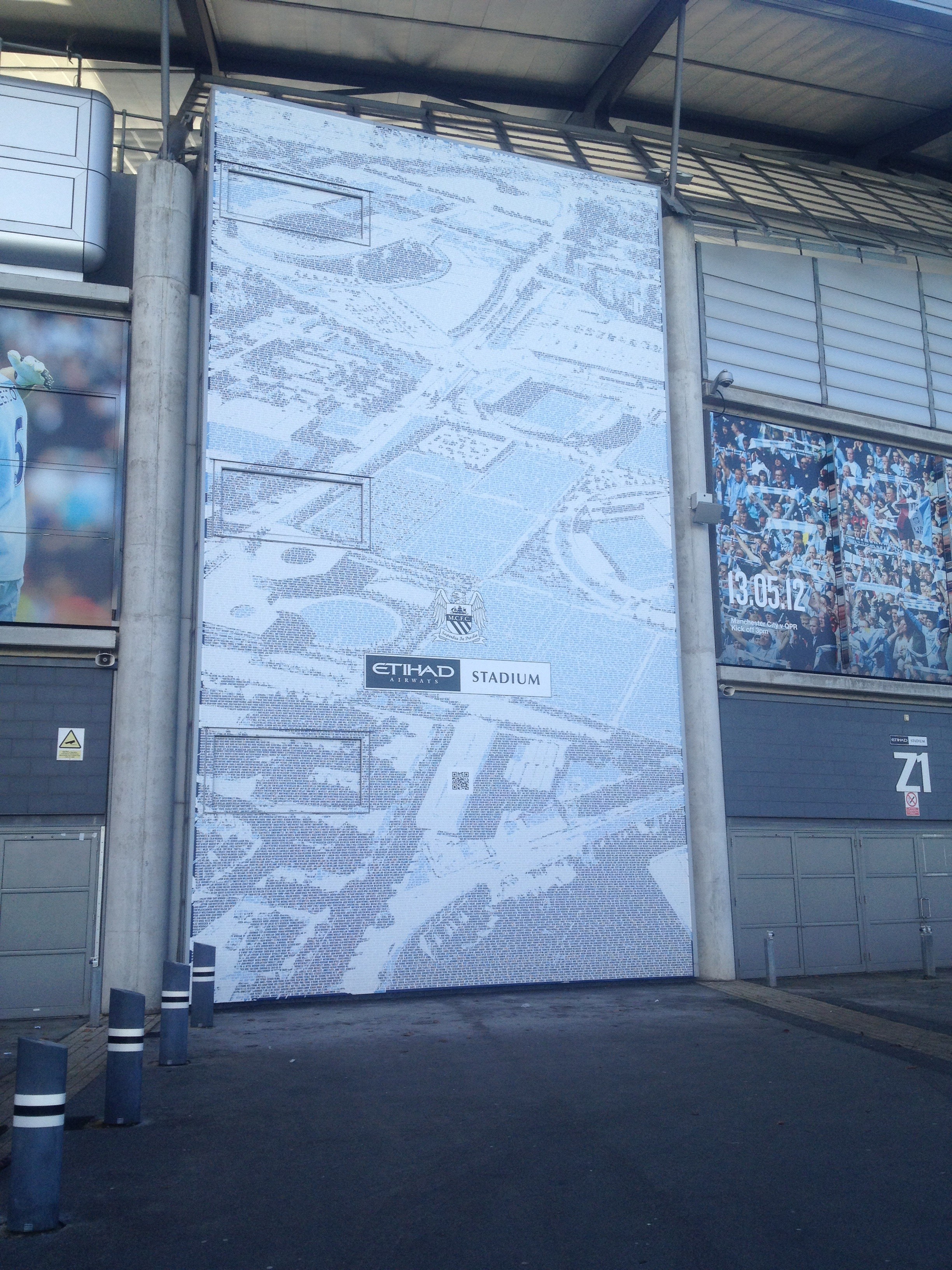 Members names make up this large art piece outside the stadium